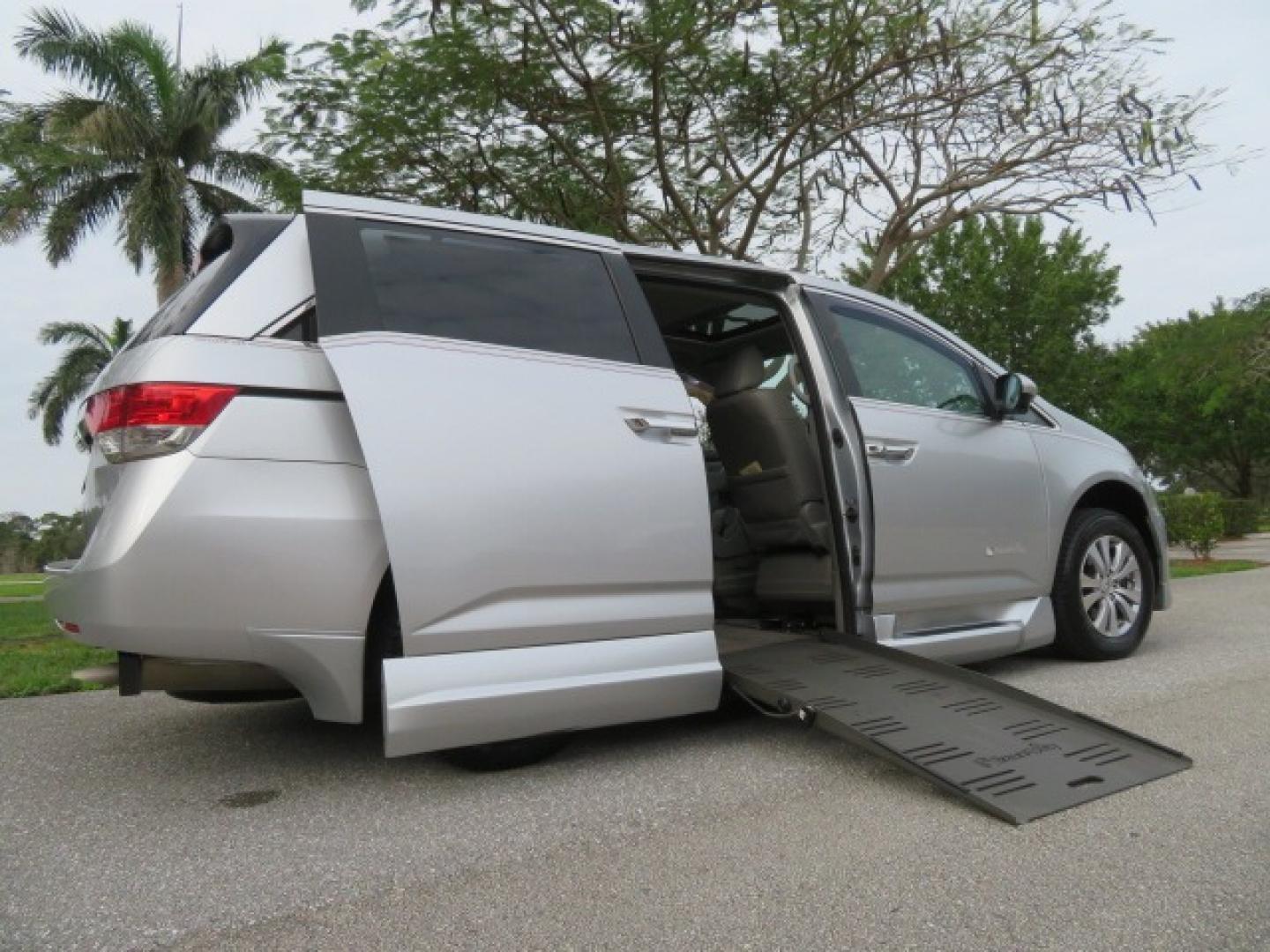 2014 Silver /GRAY Honda Odyssey EX-L (5FNRL5H68EB) with an 3.5L V6 SOHC 24V engine, 6-Speed Automatic transmission, located at 4301 Oak Circle #19, Boca Raton, FL, 33431, (954) 561-2499, 26.388861, -80.084038 - You are looking at Gorgeous Low Mileage 2014 Honda Odyssey EX-L Braunability Freedom Van Handicap Van Wheelchair Van Conversion Van with 25K Original Miles, Power Side Entry Ramp with Kneeling Van Function, Passenger Side Quick Lock System (same as ez lock), Quick Release Front Seats, Tie Down Syste - Photo#2